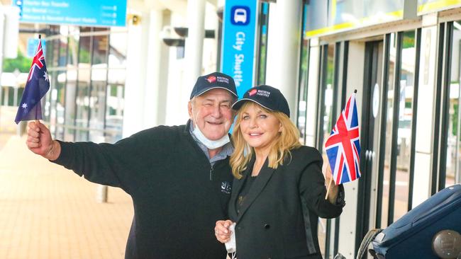 Happy days... Marshall and Denise Capel clear customs as the first Qantas international flight out of London arrives in Darwin in February, 2022. Picture: Glenn Campbell