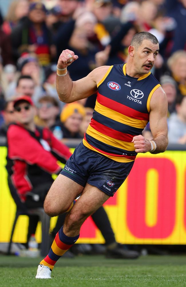 Taylor Walker celebrates a goal early in the clash with the Hawks. Picture: Sarah Reed/AFL Photos via Getty Images.