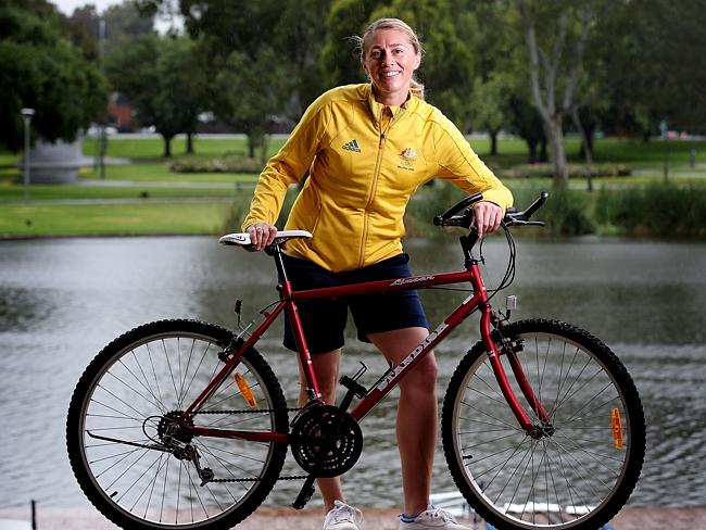 Amber Halliday is back riding her bike again while coaching rowing students. Picture: Sarah Reed