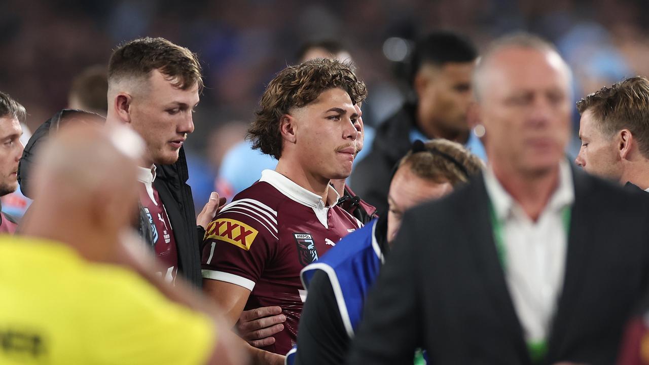 Walsh was helped from the field. Photo by Cameron Spencer/Getty Images