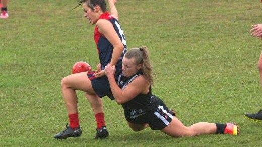 Masson lays a tackle against Wayback. Picture: Supplied