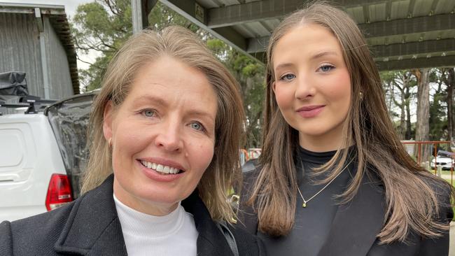 Mornington women Katie and Ally Macinnis were among those queuing for a cheese plate from Boatshed Cheese. Picture: Lucy Callander