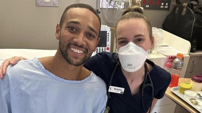 Mr Ofosu-Amaah with off-duty nurse Briesha Bormann who gave him CPR at the game.