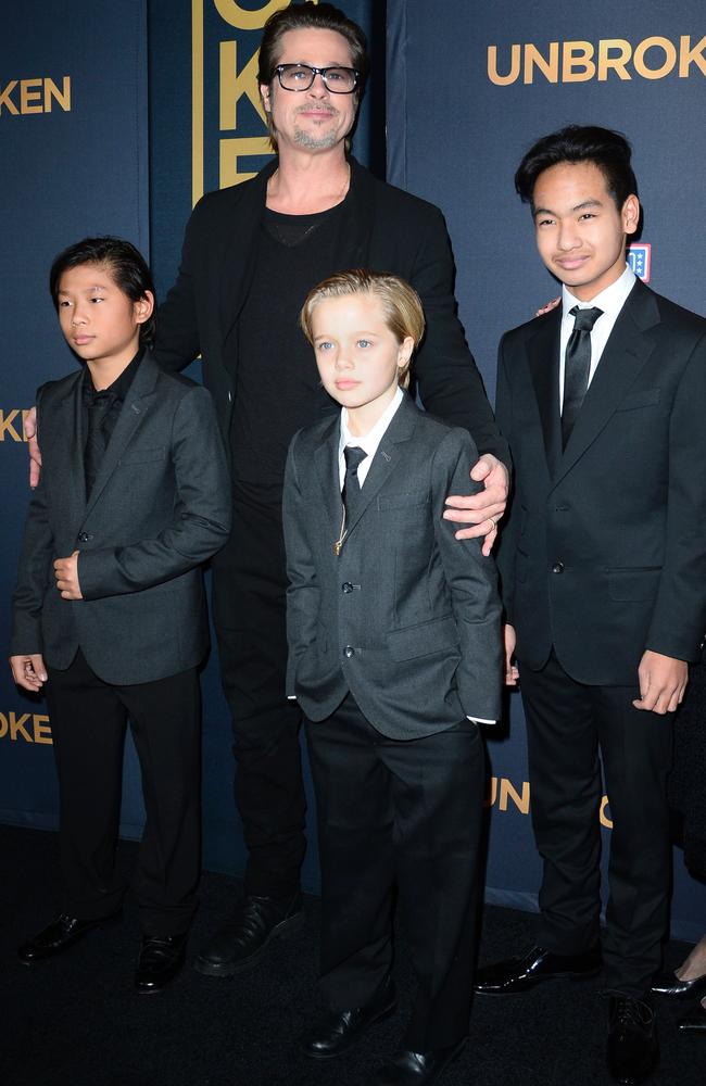 Brad Pitt with children Pax, Shiloh and Maddox in 2014. Picture: AFP/Robyn Beck