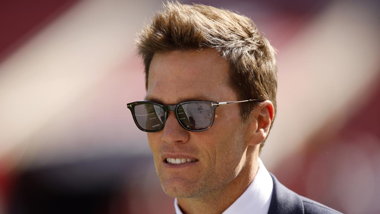 TAMPA, FLORIDA - JANUARY 05: Broadcasters Tom Brady looks on during warm ups prior to the game between the New Orleans Saints and the Tampa Bay Buccaneers at Raymond James Stadium on January 05, 2025 in Tampa, Florida. (Photo by Mike Ehrmann/Getty Images)