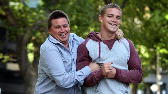 Paul Couch and son Tom celebrate his selection by Melbourne in the draft.