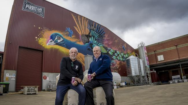 Pirate Life co-founder Michael Cameron and Quality Wool founder Mark Dyson with the new beer celebrating Quality Wool’s 30th anniversary. Pic: Roy VanDerVegt