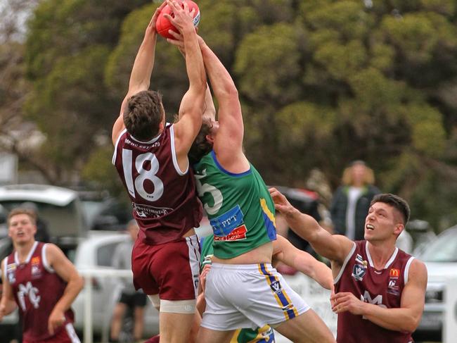 Liam Carter marks over the top of Liam Hepworth. Picture: Aaron Cook