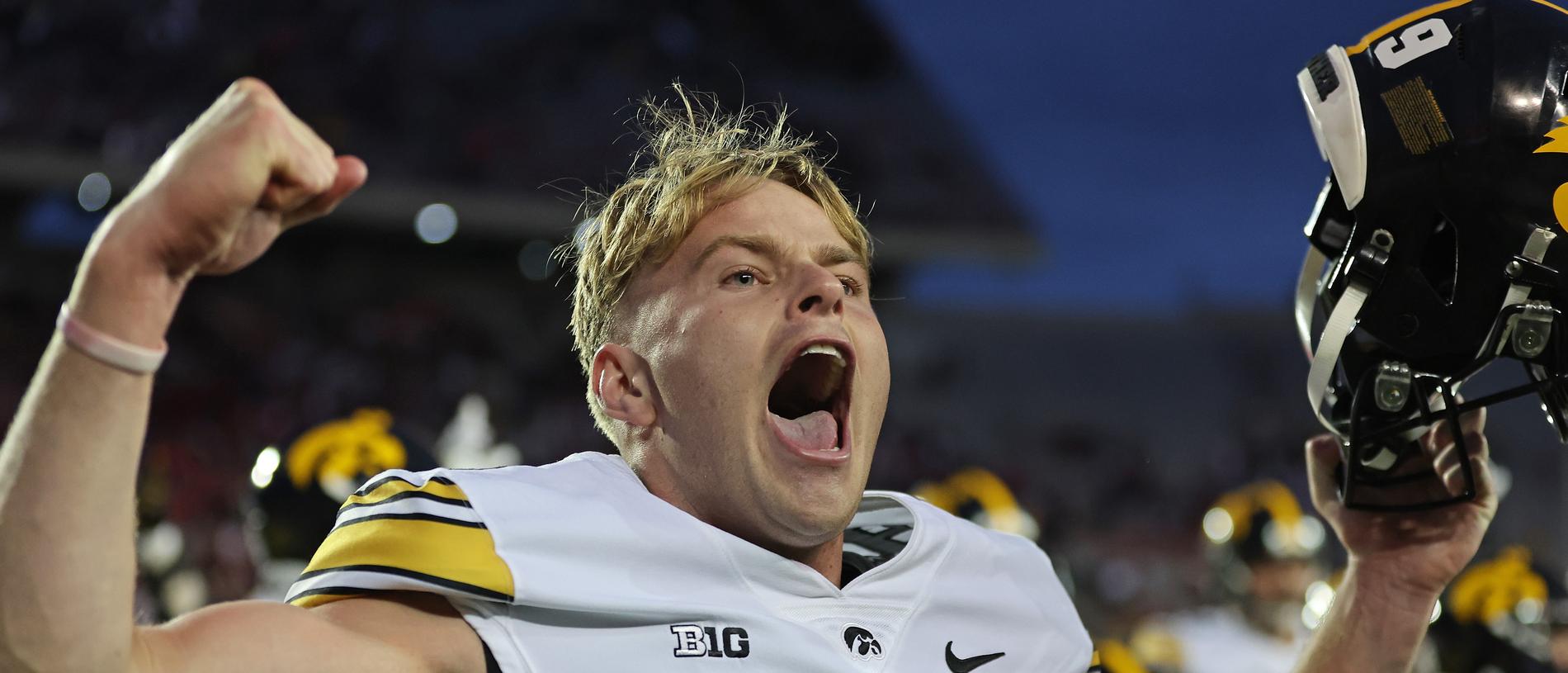 MADISON, WISCONSIN - OCTOBER 14: Tory Taylor #9 of the Iowa Hawkeyes celebrates after the Hawkeyes defeated the Wisconsin Badgers at Camp Randall Stadium on October 14, 2023 in Madison, Wisconsin. (Photo by Stacy Revere/Getty Images)