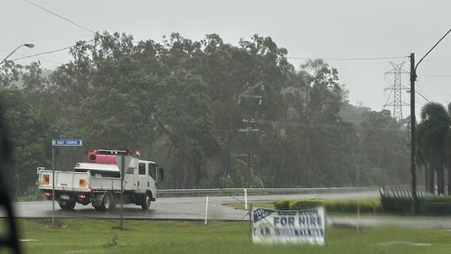 Power lines down just off Bruce Highway at the Balgal Beach turn off. 10.30am, Feb 2