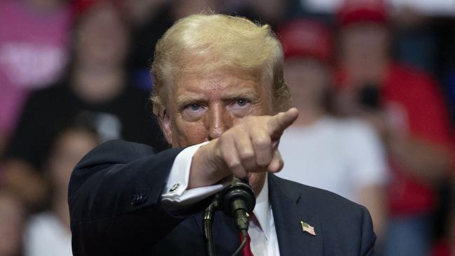 GRAND RAPIDS, MICHIGAN - JULY 20: Republican Presidential nominee former President Donald J. Trump holds his first public campaign rally with his running mate, Republican Vice Presidential nominee U.S. Senator J.D. Vance (R-OH) (not pictured), at the Van Andel Arena on July 20, 2024 in Grand Rapids, Michigan. This is also Trump's first public rally since he was shot in the ear during an assassination attempt in Pennsylvania on July 13. Photo by Bill Pugliano/Getty Images) (Photo by BILL PUGLIANO / GETTY IMAGES NORTH AMERICA / Getty Images via AFP)