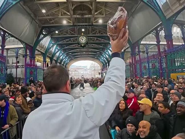 Londoners flock to festive Christmas meat auction