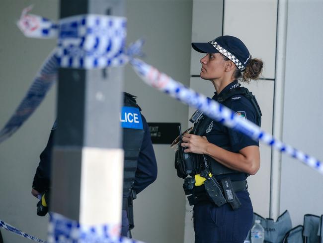 Police at the scene where Vyleen White, 70, of Redbank Plains, was stabbed in the chest in the car park at Redbank Plains Shopping Centre. Picture: Glenn Campbell