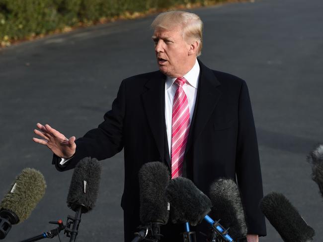 US President Donald Trump addresses the Roy Moore controversy outside the White House on Tuesday. Picture: AFP/Andrew Caballero-Reynolds