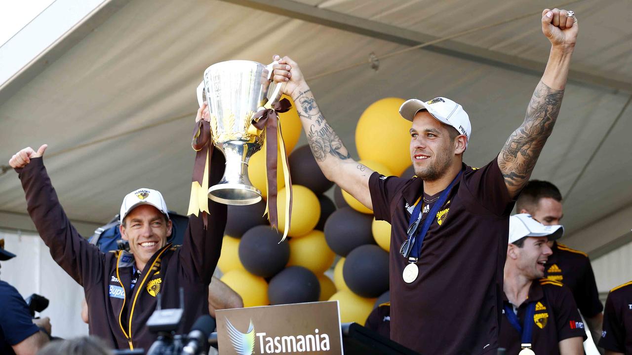 Lance Franklin and Alistair Clarkson with the 2013 premiership cup. Picture: Michael Klein