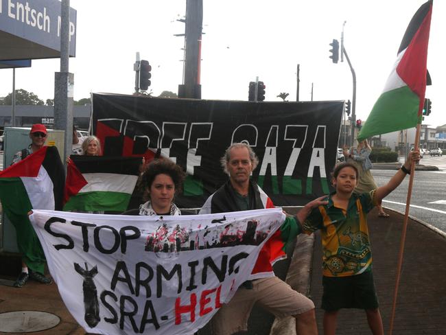 Free Palestine FNQ members led by Geoff Holland and Monique Jeffs protest out the front of the office of Leichhardt MP Warren Entsch calling for stronger action from the Australian Government against Israel's war in Gaza. Photo: Dylan Nicholson