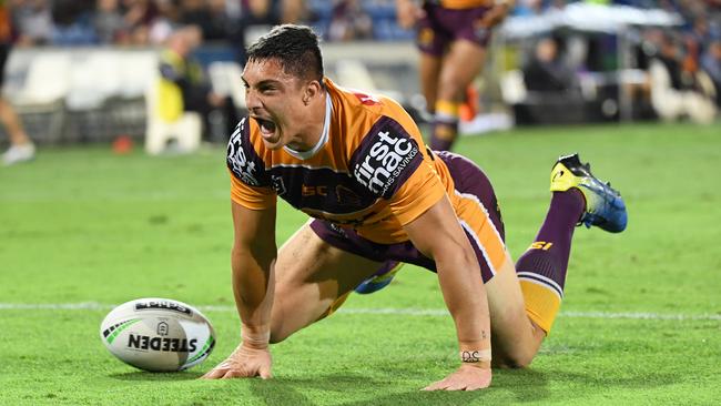 Kotoni Staggs celebrates a try for the Broncos. Picture: AAP Image/Dave Hunt