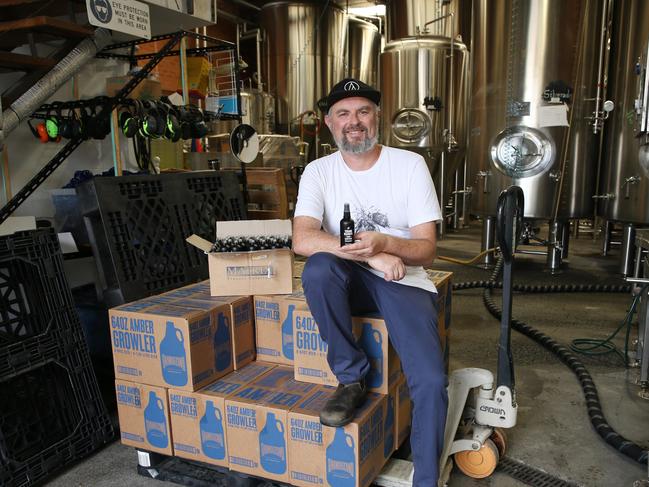 03/04/2020. Richard Adamson co-owner of Young Henry's pictured at their distillery in Newtown in Sydney's inner-west. They have started making hand sanitiser,  created by distilling beer that will no longer be going to pubs and have just completed their second batch. Britta Campion / The Australian