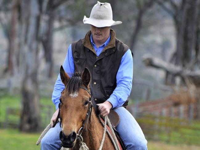 Waratahs winger Alex Newswome riding on his family's cattle farm.