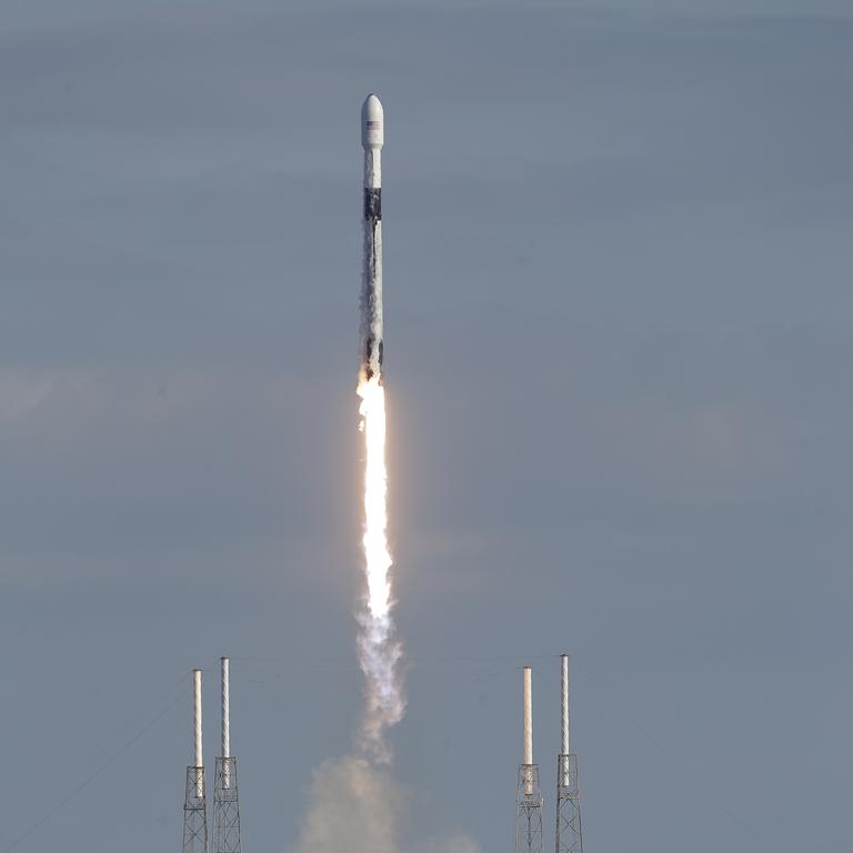 A Falcon 9 SpaceX rocket with a payload of approximately 60 satellites for SpaceX's Starlink broadband network lifts off on Thursday morning (AEDT). Picture: AP Photo/John Raoux