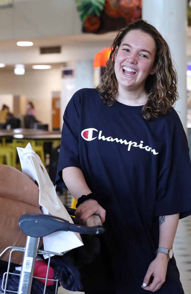 Emma Hoey arrives back in Brisbane after a escaping Europe via the US. Picture: Liam Kidston