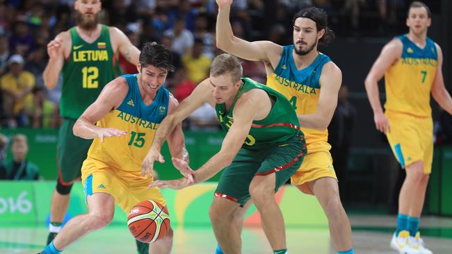 Damian Martin (L) battles with Lithuania’s Vaidas Kariniauskas. Picture: Alex Coppel.