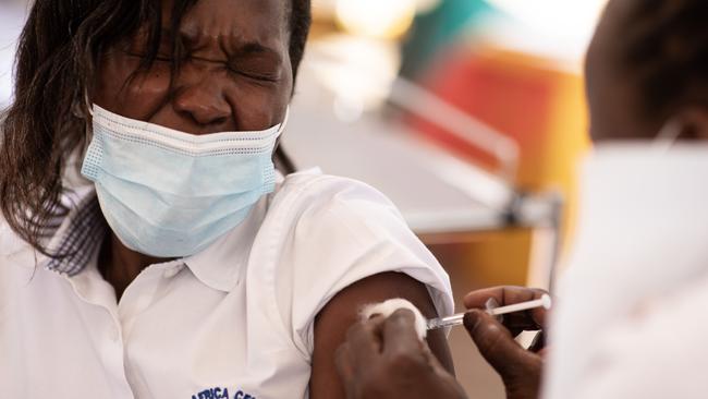 A healthcare professional is injected with the AstraZeneca vaccine in Kamala, Uganda, last week. Picture: Getty Images