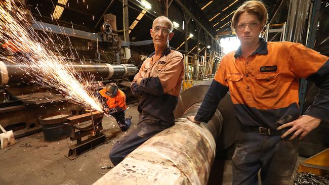 Paul Stringer 56, and his son Eli, 15, at the Bundaberg Walkers Engineering foundry in Bundaberg yesterday. Picture: Lyndon Mechielsen. 