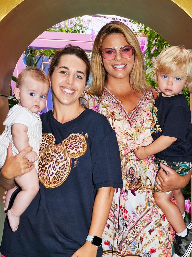 Hayley Willis, Fiona Falkiner and their two young children.