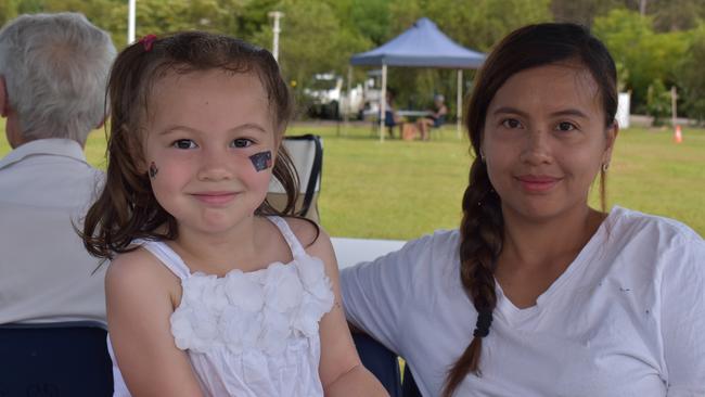 Zayda and Zyrian Koitlaa enjoying the shade at the Glenwood Community Hall.