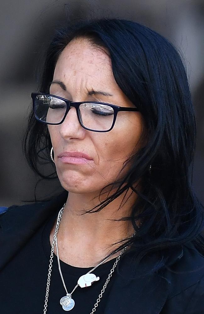 Kelly Liddicoat (black hair) leaves Maroochydore Court House. Picture: Patrick Woods.