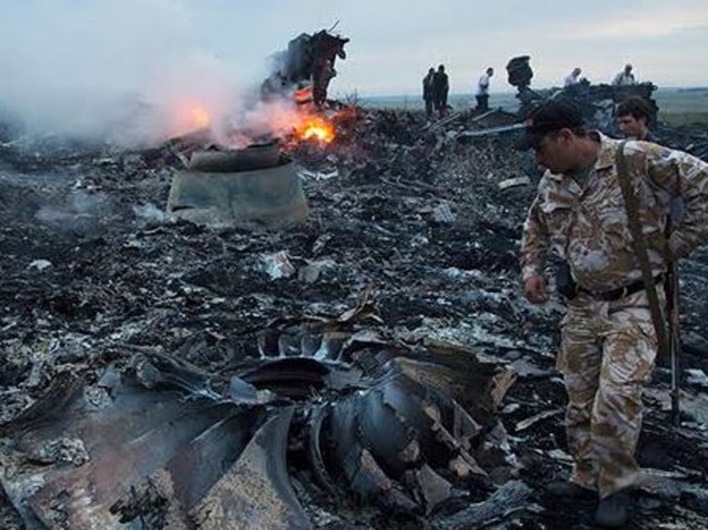 Soldiers at the MH17 site shortly after the crash. Picture: Supplied