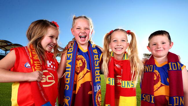 AFL fans Matilda Mooney 5, Amelia Shelton 7, Bronte Mooney, 7, and Harley Shelton, 5, will get plenty of footy to watch with all the Melbourne clubs in Queensland as well as having their own clubs the Suns and Lions at home all the time. Picture: Adam Head