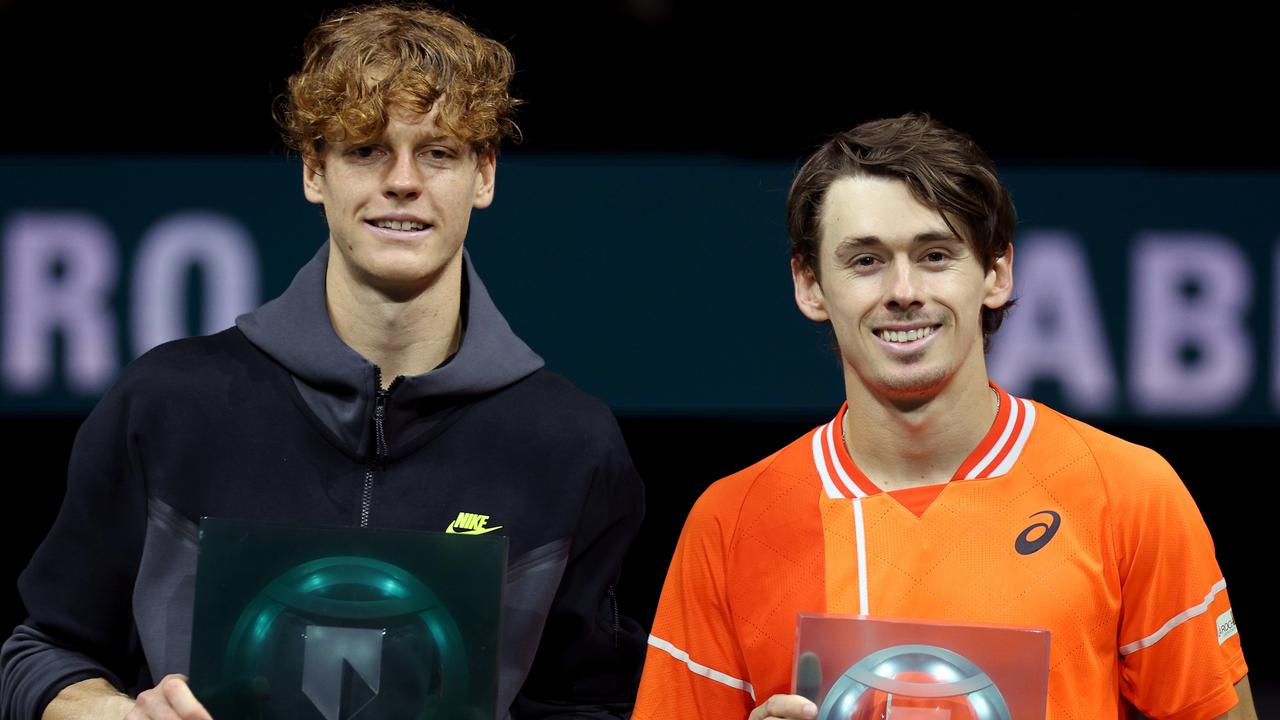 Jannik Sinner with the winners trophy after victory against Alex de Minaur. Photo by Dean Mouhtaropoulos/Getty Images.