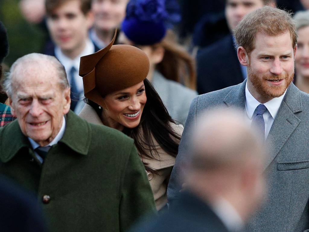 Prince Philip, Meghan Markle and Prince Harry. Picture: Adrian DENNIS / AFP)