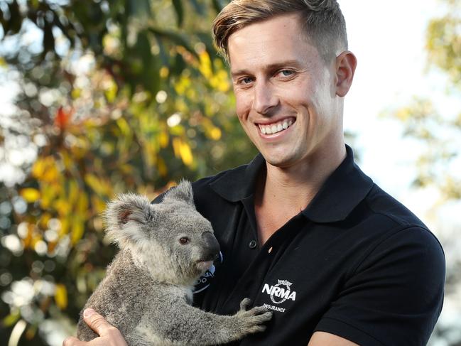 Arlo with his carer, Jarrod Schenk from Wildlife HQ Zoo. Picture: Jonathan Ng