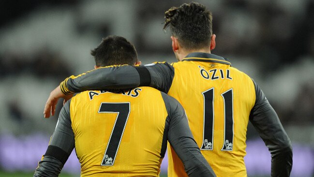 Alexis Sanchez and Mesut Ozil. (Photo by Stuart MacFarlane/Arsenal FC via Getty Images)