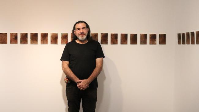 Khaled Sabsabi with his works at Mosman Art Gallery. Picture: Supplied