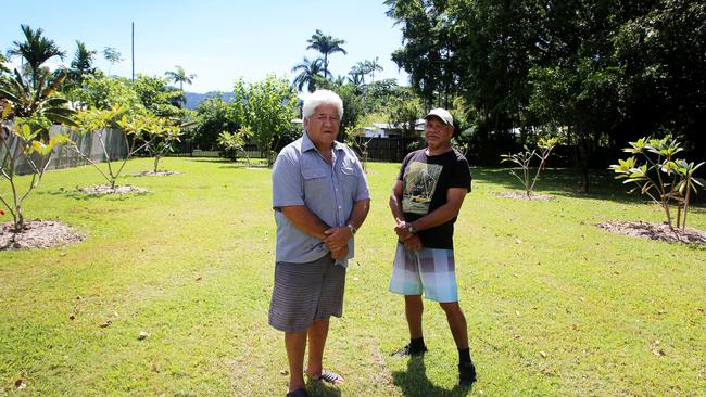 Manoora Community Advisory Group member, Ono Kata and Torres Strait and Cape York elder, Pearson Wigness at the Murray Street memorial site where frangipani trees are planted in memory of the children. PHOTO: TONI CALDWELL