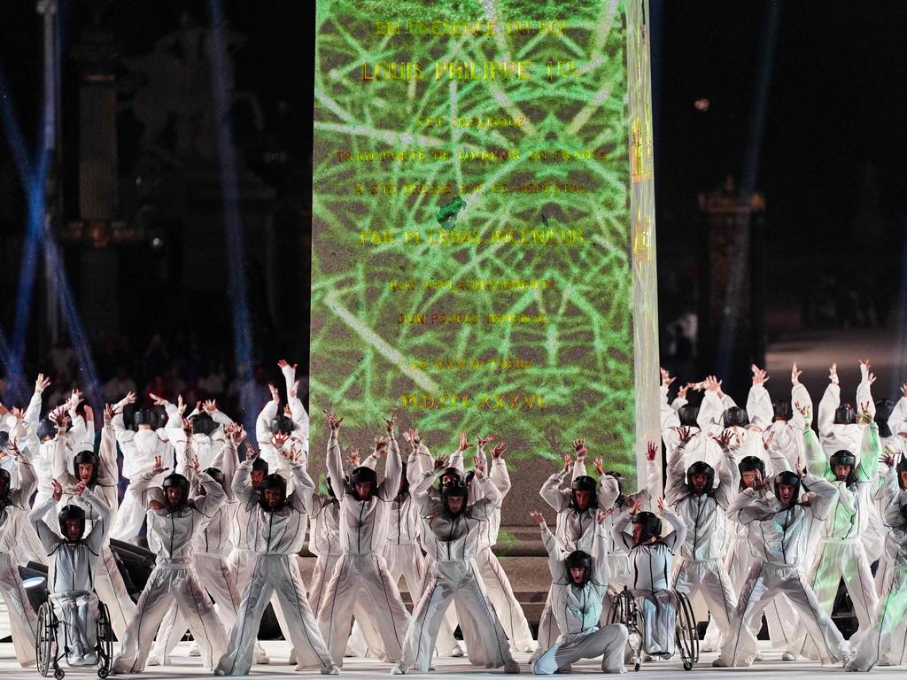 Dancers performs in front of the Obelisque de Louxor (Luxor Obelisk) at the Place de la Concorde. Picture: Dimitar Dilkoff/AFP