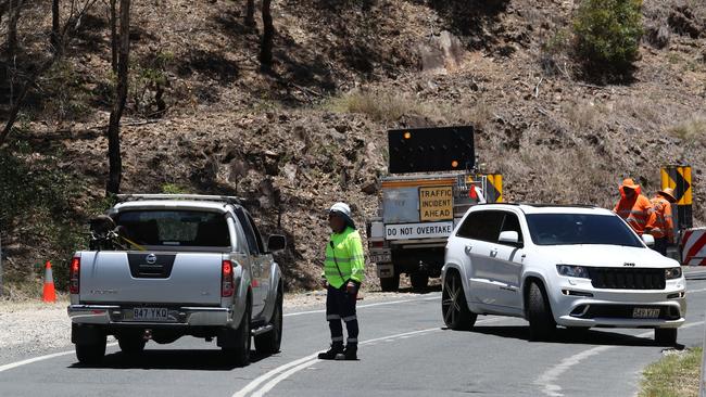 Scene of a roadblock near a serious traffic crash on Nerang-Murwillumbah Road in the Gold Coast Hinterland. Photograph: Jason O'Brien.