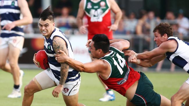 Port Douglas' Kurt Bradshaw proves a handful in the AFL Cairns men's grand final match between the Port Douglas Crocs and the South Cairns Cutters, played at Cazalys Stadium. PICTURE: BRENDAN RADKE.