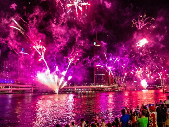 People watch fireworks ahead of New Year's Eve over the Brisbane River at Southbank in Brisbane, Monday, December 31, 2018. (AAP Image/Glenn Hunt) NO ARCHIVING