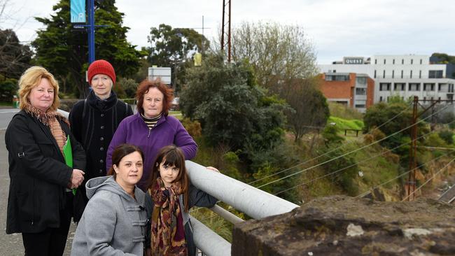 Fairy Hills Residential Group opposed plans for a building on Upper Heidelberg Rd, Ivanhoe. (Left to right) Robyn Roberts, Pippa Griffith, Julia Stafford, Helen Mavrokefalos (front) and Kristiana, 5. Picture: Josie Hayden