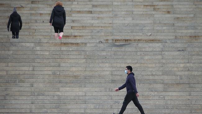 Masks may be mandatory in Melbourne for some time. Picture: Ian Currie/NCA NewsWire.