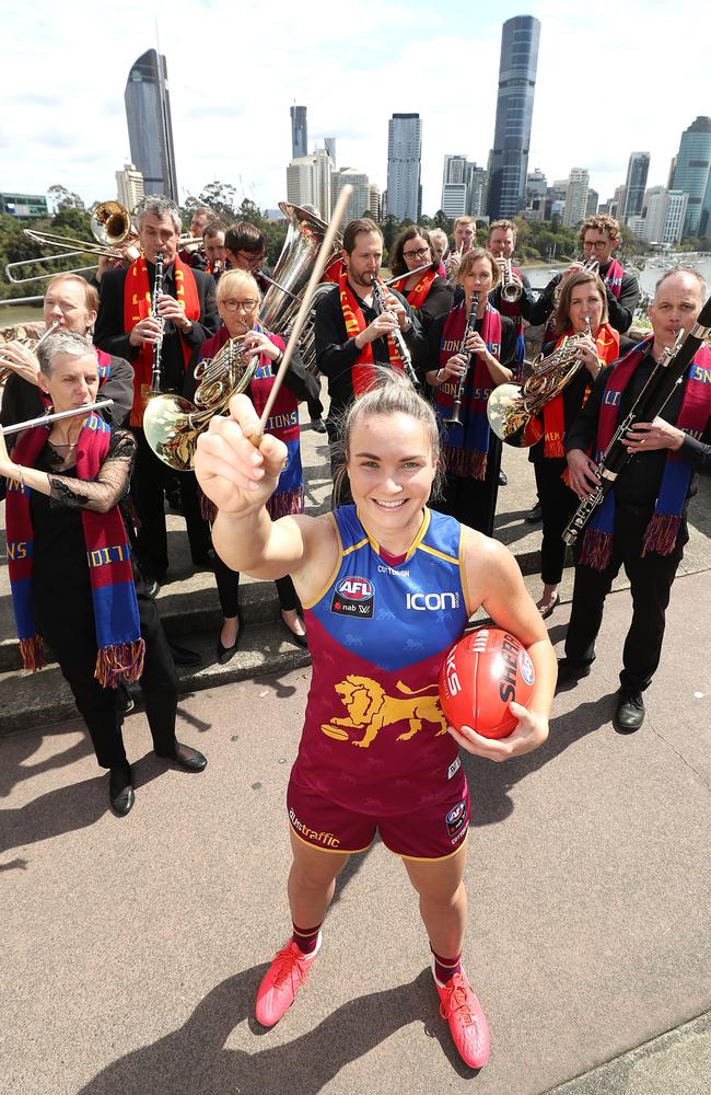 Brisbane Lions AFLW Best and Fairest player Emily Bates with the Queensland Symphony Orchestra. Picture: Peter Wallis