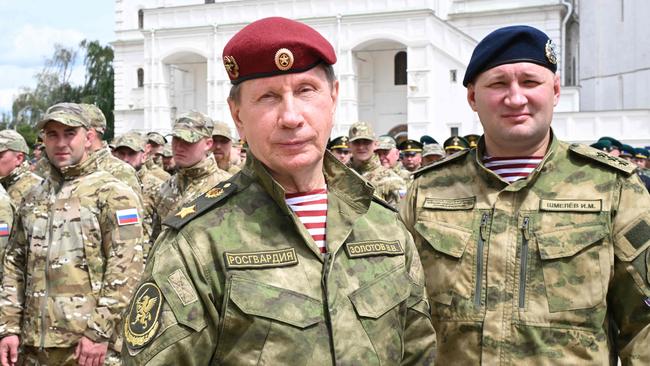 Russia's National Guard head Viktor Zolotov with troops in the grounds of the Kremlin. Picture: AFP.