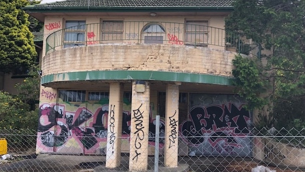 A section of the derelict McLeod House at Allambie Heights on Monday. Rumours are circulating that the former headquarters of the Cerebral Palsy Alliance,will be put up for sale after it closed its doors 10 years ago. Picture: Jim O'Rourke