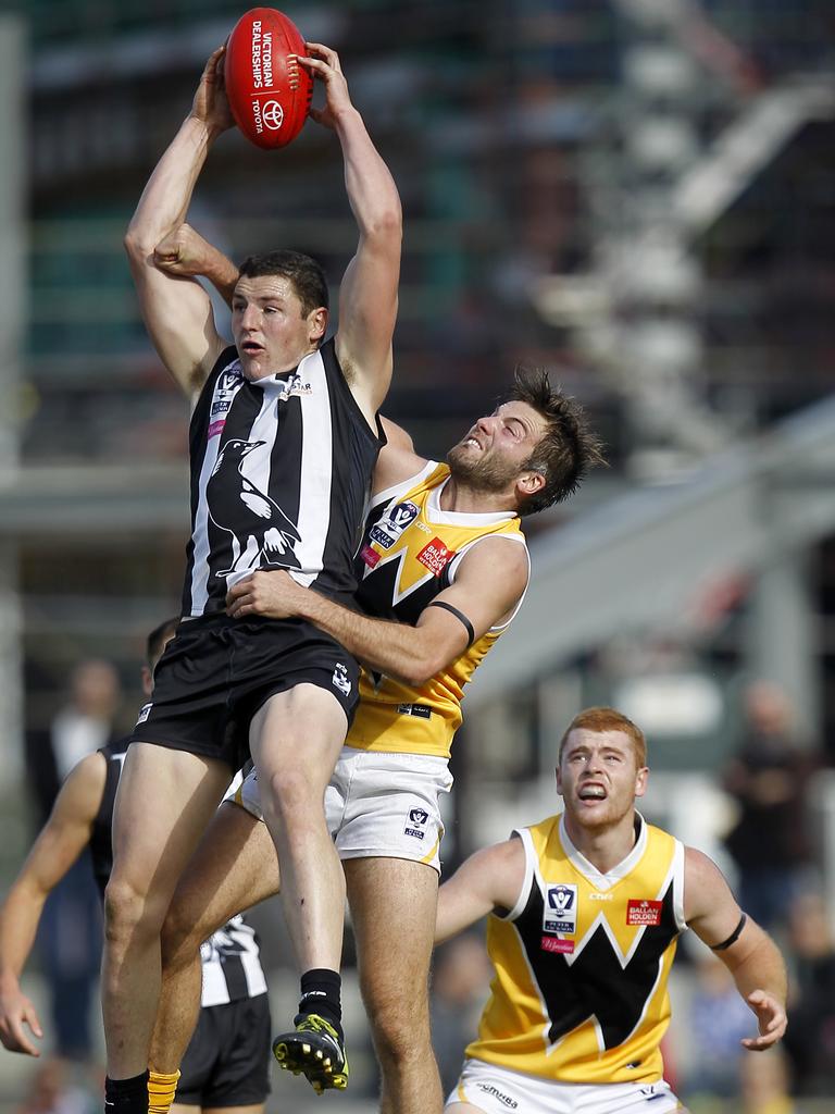 Scott Greenhough flies for the ball in Collingwood colours back in 2015. Picture Yuri Kouzmin