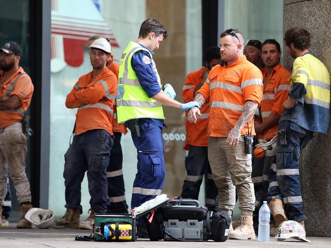 Workers from the building that caught fire were assessed by paramedics. Picture: Sam Ruttyn